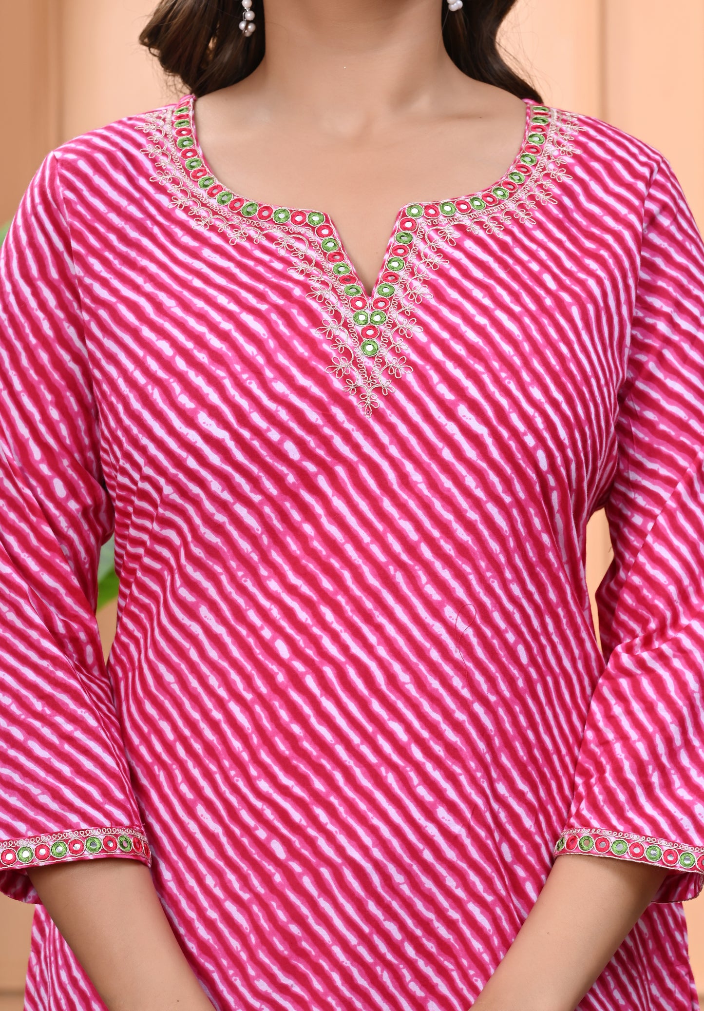 Women's Pink Printed Cotton Kurti with Embroidered Neckline and 3/4 Sleeves"