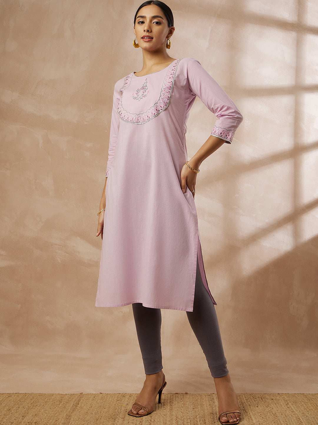 Light Pink Solid Straight Kurti with Embroidered Yoke Design