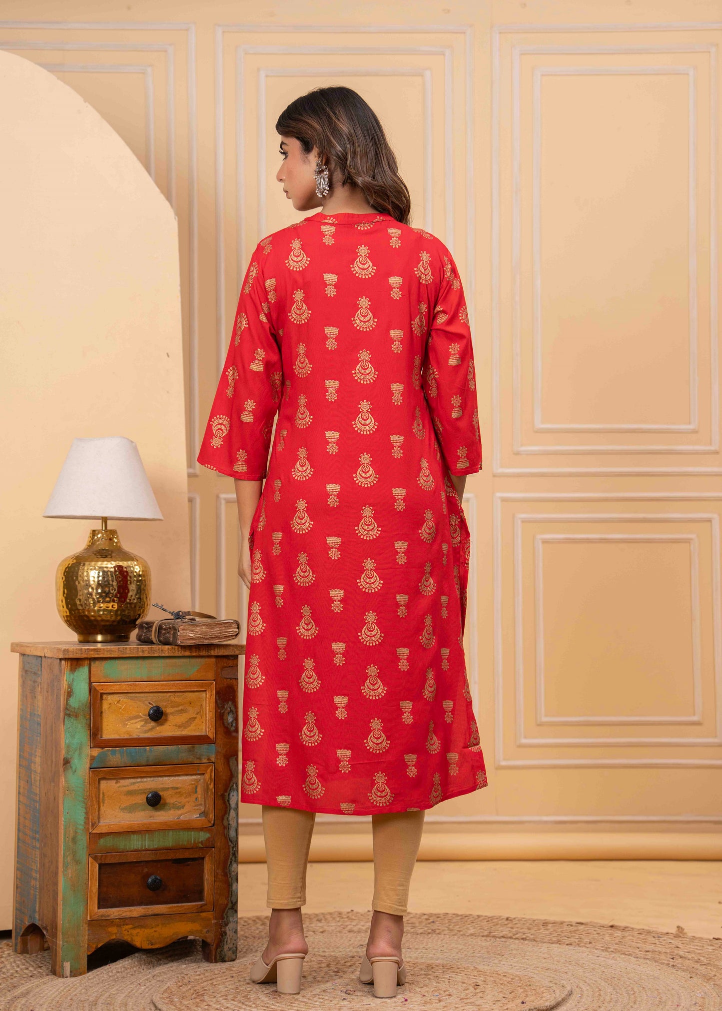 Red Printed Kurti with Beige Leggings