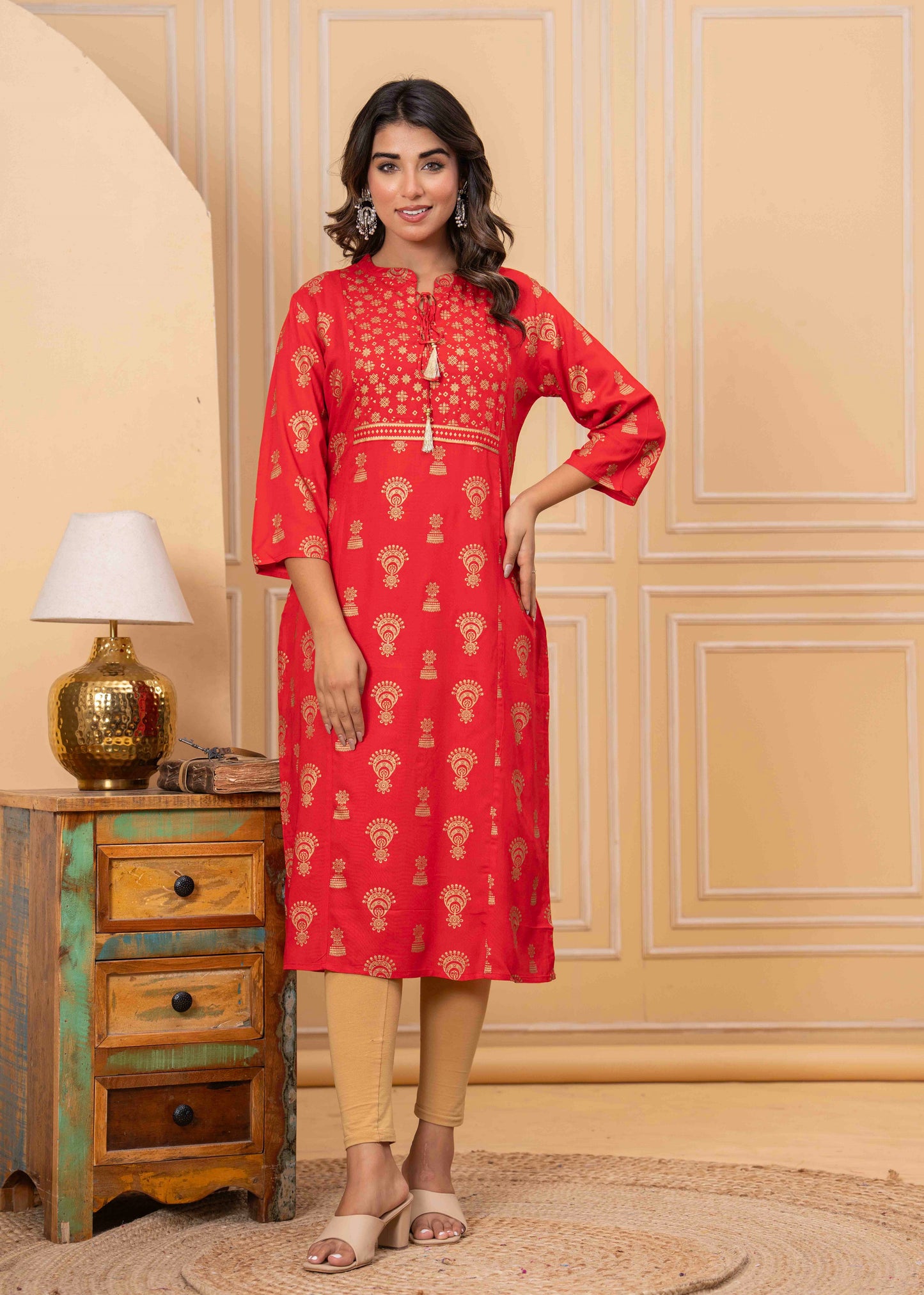 Red Printed Kurti with Beige Leggings