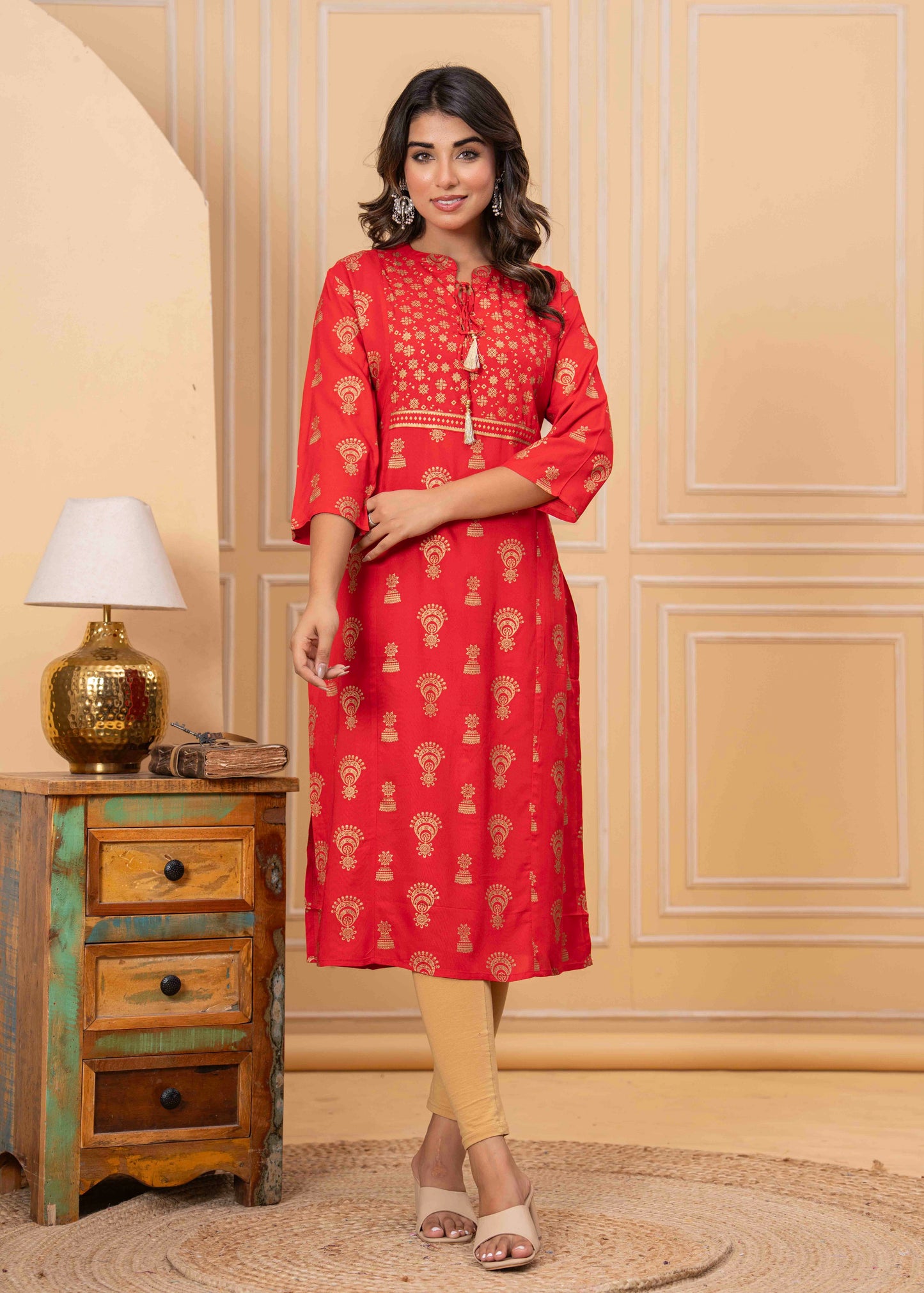 Red Printed Kurti with Beige Leggings