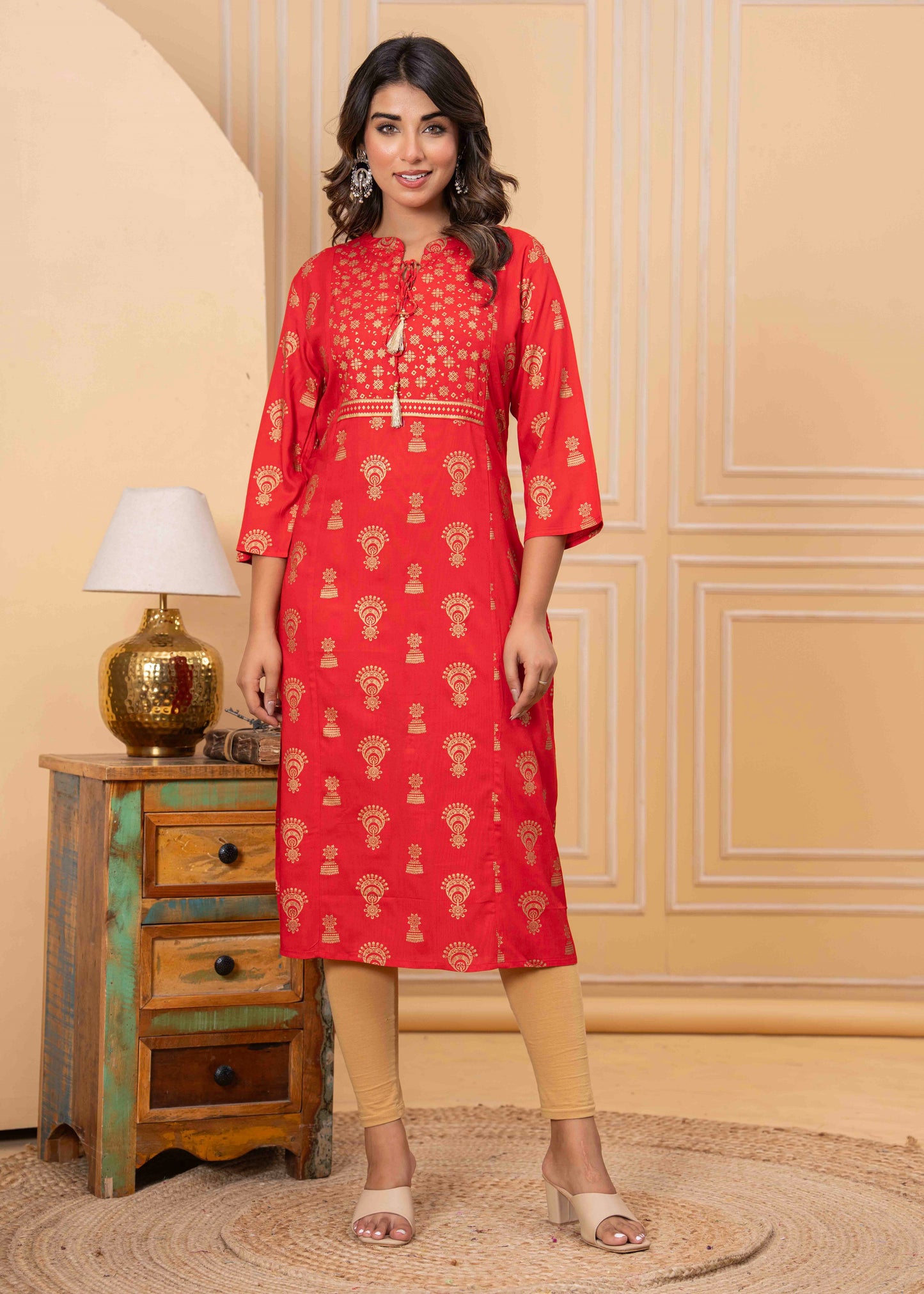 Red Printed Kurti with Beige Leggings