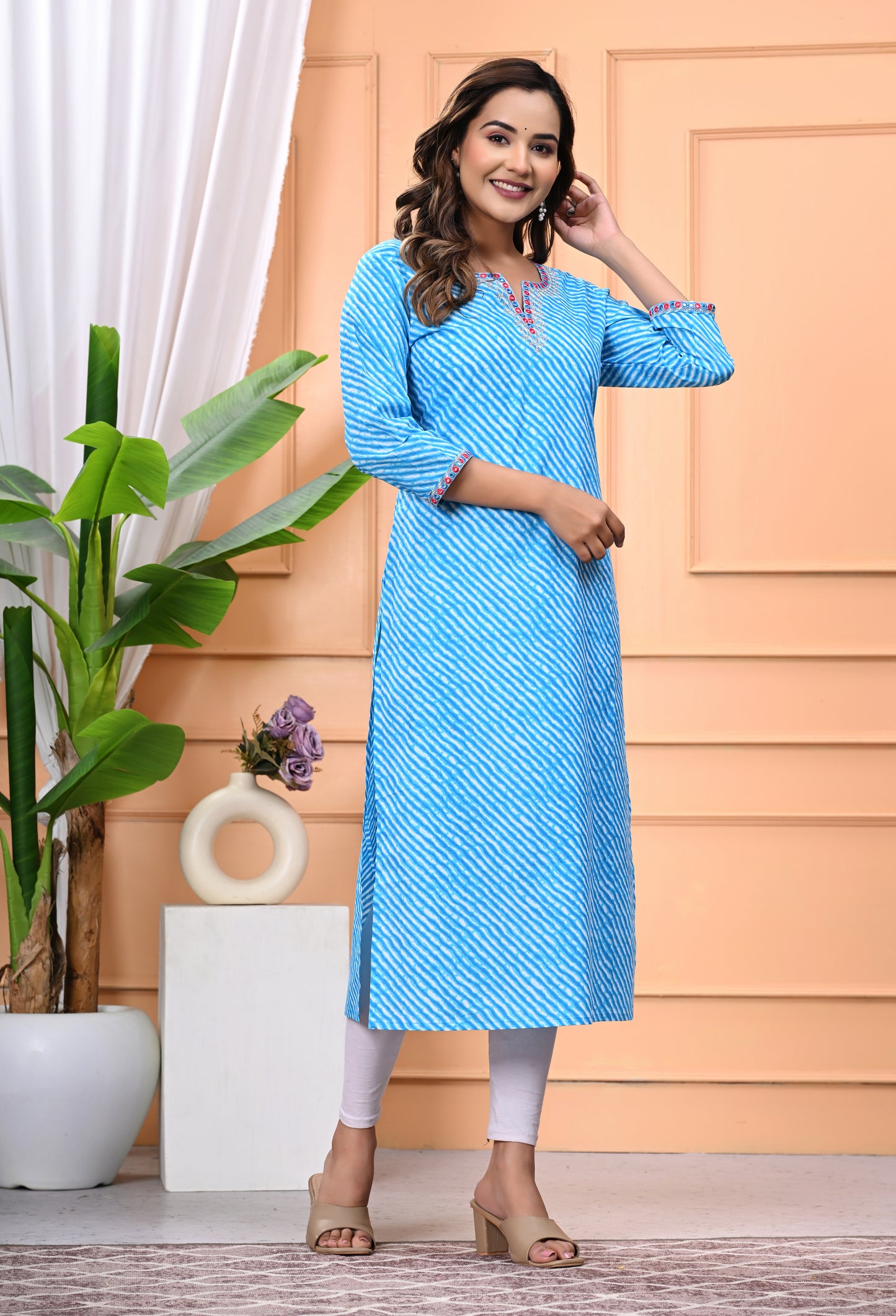 Women's Sky Blue Printed Cotton Kurti with Embroidered Neckline and 3/4 Sleeves"