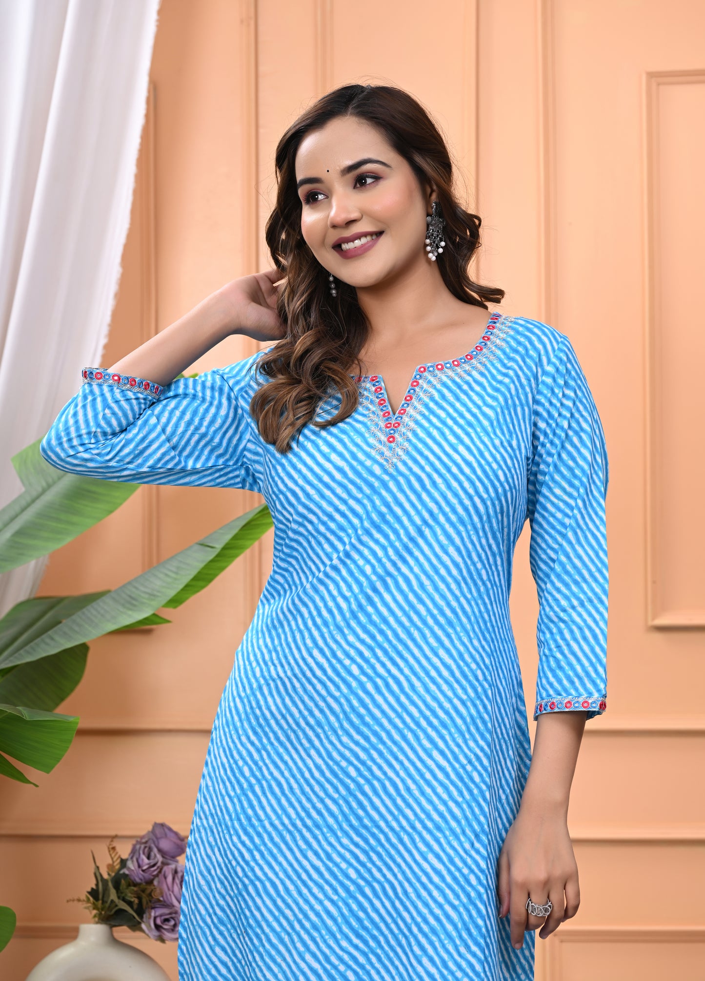 Women's Sky Blue Printed Cotton Kurti with Embroidered Neckline and 3/4 Sleeves"