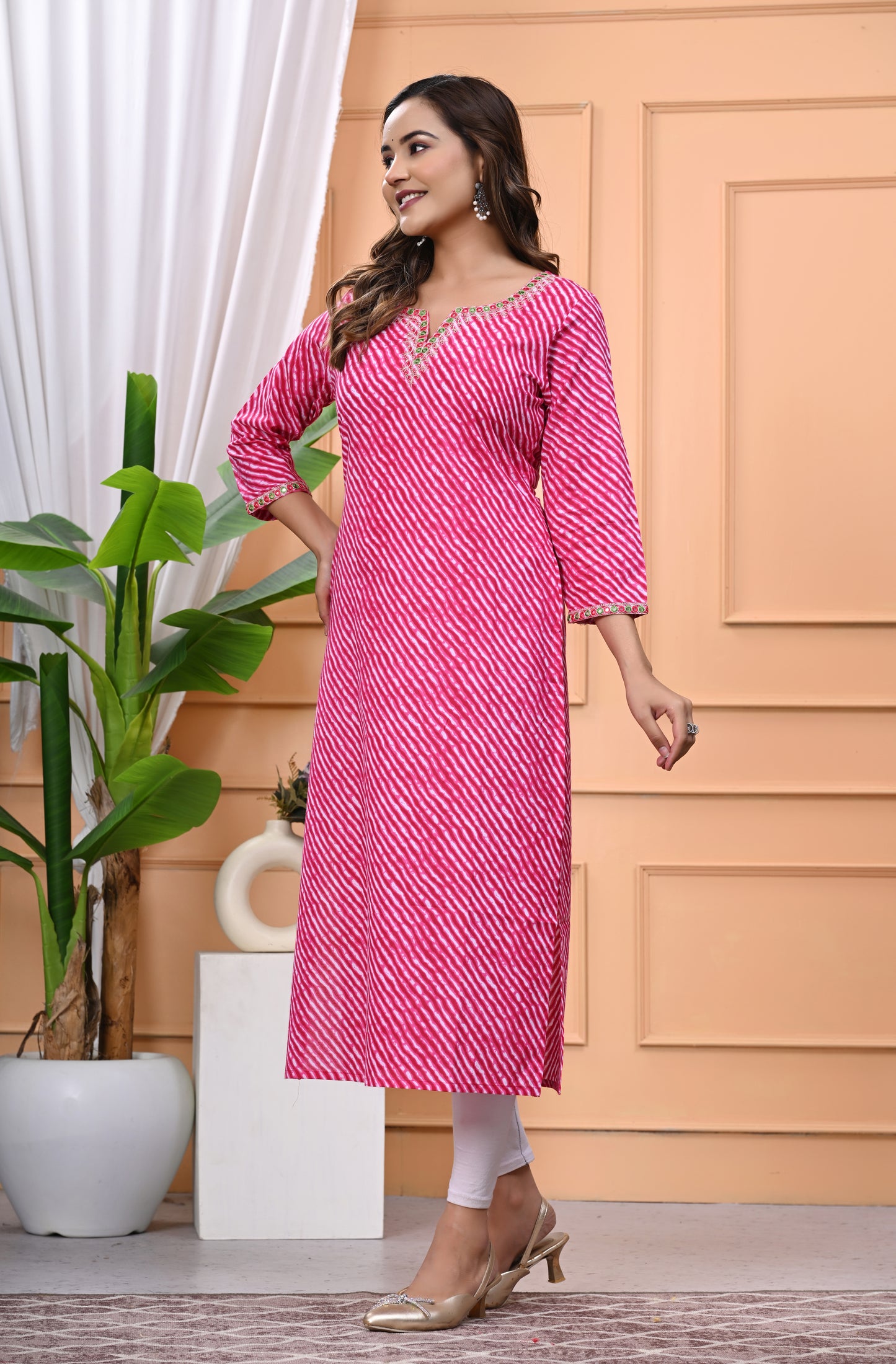Women's Pink Printed Cotton Kurti with Embroidered Neckline and 3/4 Sleeves"