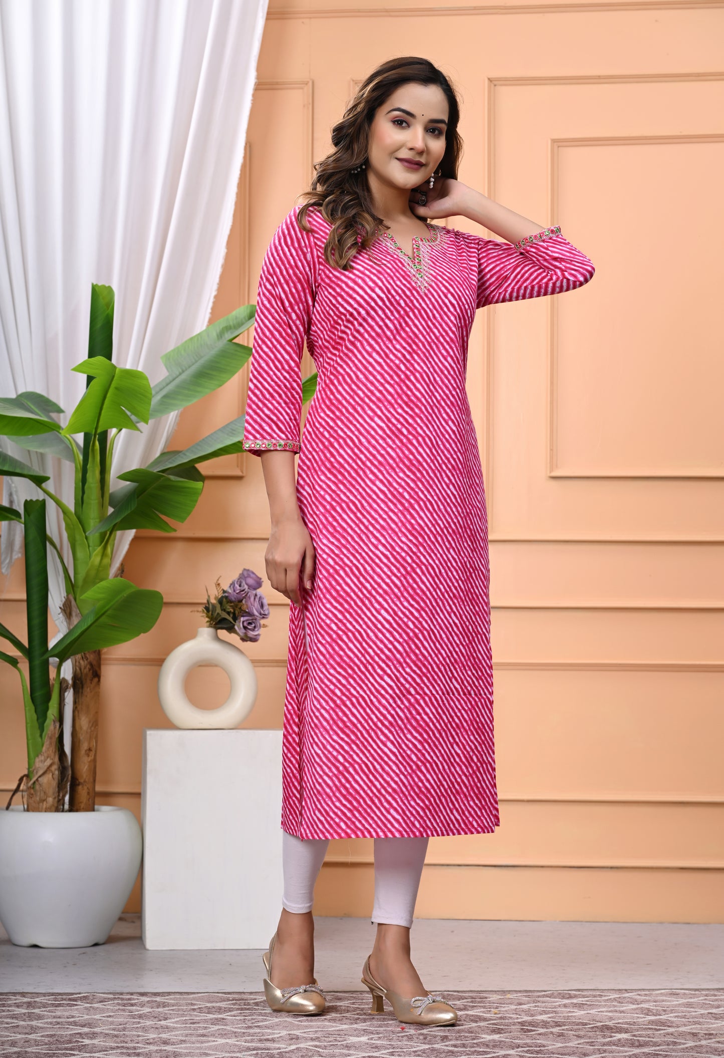 Women's Pink Printed Cotton Kurti with Embroidered Neckline and 3/4 Sleeves"