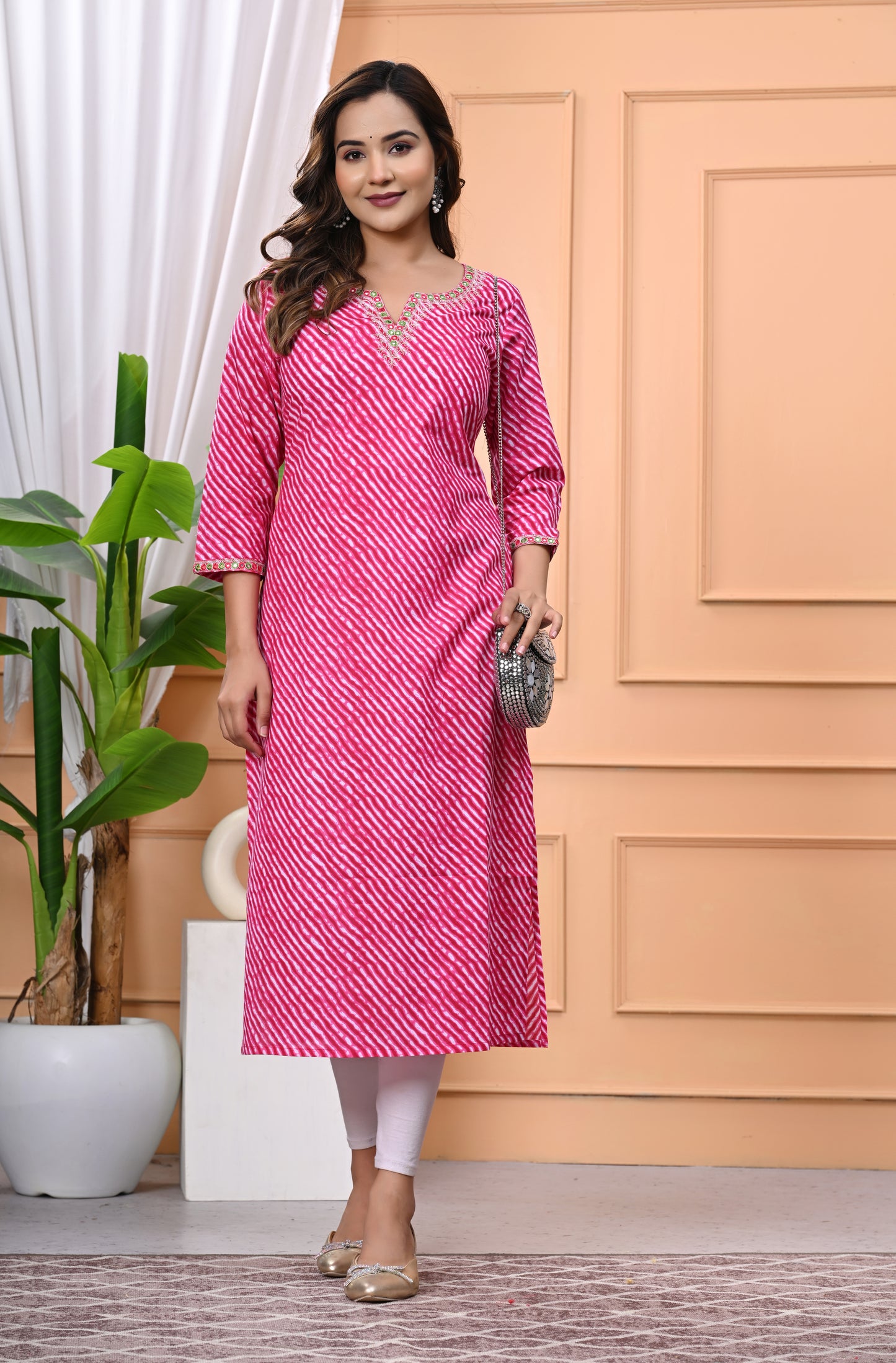 Women's Pink Printed Cotton Kurti with Embroidered Neckline and 3/4 Sleeves"