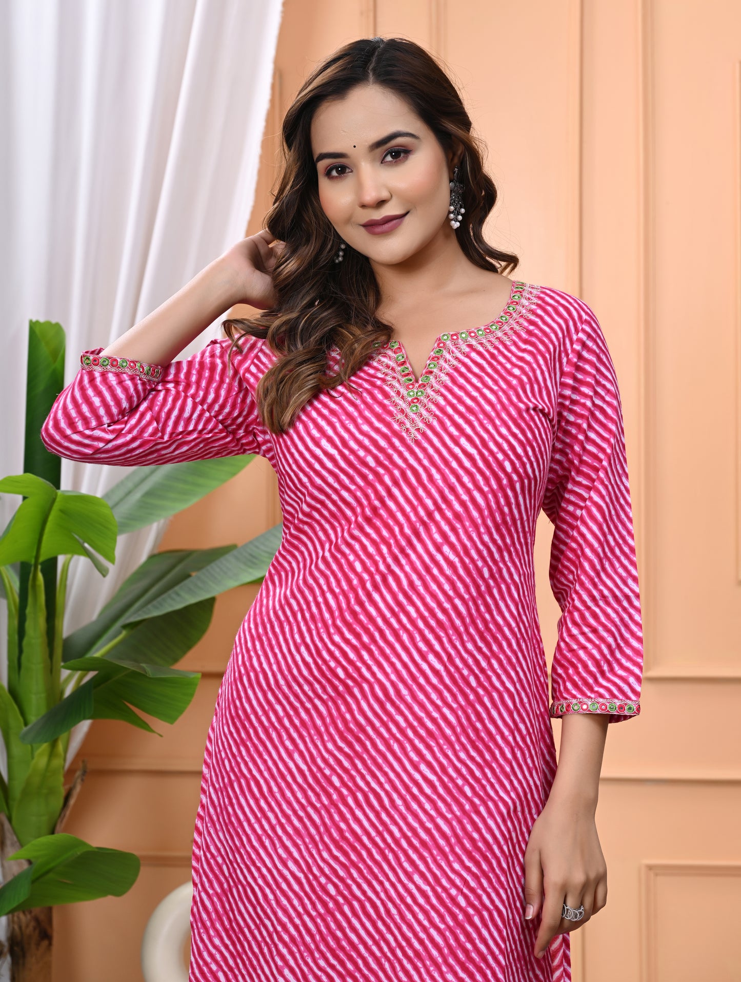 Women's Pink Printed Cotton Kurti with Embroidered Neckline and 3/4 Sleeves"
